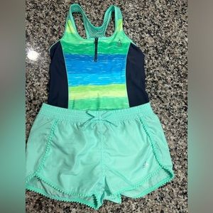 Gerry girls 2 piece swimsuit it comes with a short size large 14